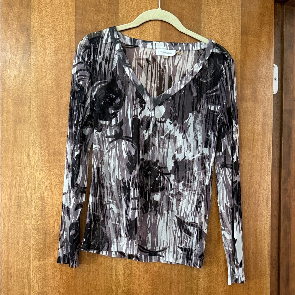 Calvin Klein size S see through long sleeve shirt